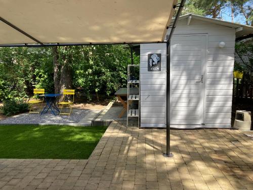 " CasitaCuriosa " chalet op camping met buitenzwembad