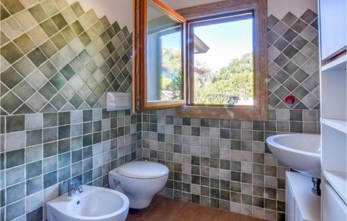 Bathroom, Awesome home in Loiri Porto San Paolo with 1 Bedrooms and WiFi in Loiri