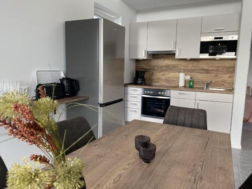 virtuve, Kuh Blick Ferienhaus Sehestedt in Stadland