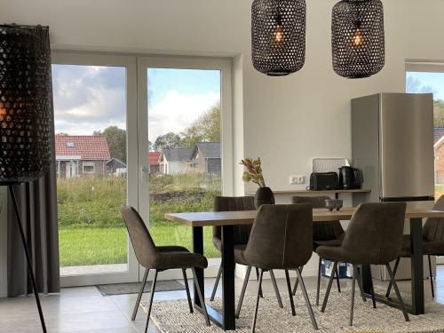 Iekārtas, Kuh Blick Ferienhaus Sehestedt in Stadland