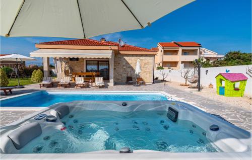 Beautiful home in Vrsi with WiFi, Jacuzzi and Outdoor swimming pool