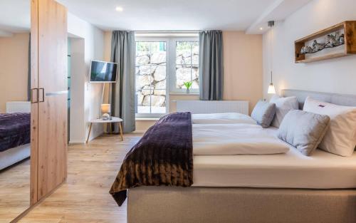 Ferienwohnung "Hirschbergsuite" - Mit Hotelfrühstück, Sauna, fast direkt am See