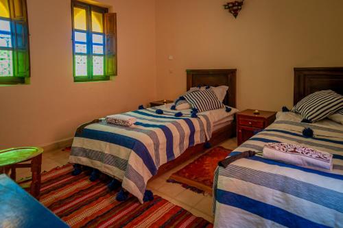 Chambre avec 2 lits