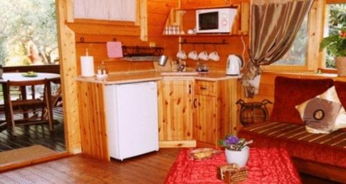 Kitchen, Spa Chalets In Olive Grove in Eliad