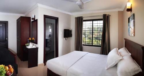 Century Grand Hotel Stop at Century Grand Hotel to discover the wonders of Wayanad. Featuring a satisfying list of amenities, guests will find their stay at the property a comfortable one. Service-minded staff will welco