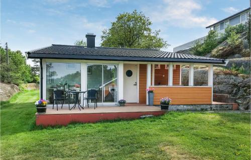 . Nice home in Stavern with 4 Bedrooms and WiFi