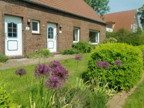 Traumhafter Nordseeurlaub im modernen Ferienhaus mit großem Garten, Kamin und Strandkorb