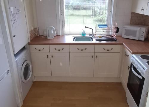 Konyha, Beautiful 2-Bed Apartment in Campbeltown in Campbeltown Városközpont