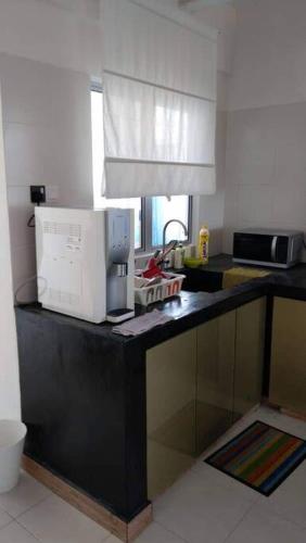 Hijauan Heights Comfy Home photo