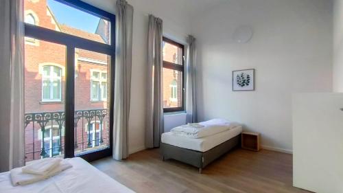 Tolstov Apartments - City Apartments with 2 , 3 and 6 Rooms - 15 Min to Messe DUS and Old Town DUS, Дюссельдорф (фото 7)