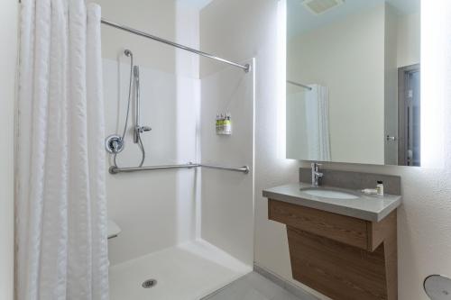 Studio Queen Suite with Mobility Accessible Roll-In Shower