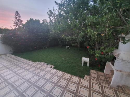 Saidia - Villa avec jardin, en bord de mer, dans une résidence fermée.