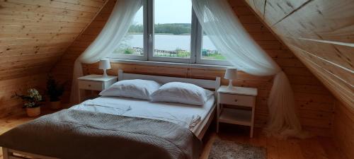 Szary domek nad jeziorem - Accommodation - Kołczewo