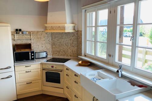 Konyha, Landhaus am Achterwasser mit Bootssteg in Rankwitz