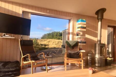 Shared lounge/TV area, Luxury 109m2 cottage DunesNorthSea LøkkenBlokhus Denmark in Hvorup Klit