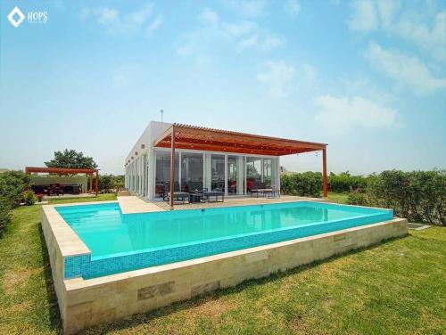 . HOP BUZIOS exclusiva oasis y playa en Chincha