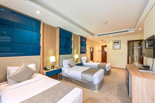 Al Mansour Suites Hotel Room Type - Standard Triple Room