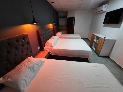 2 double beds, 1 twin bed