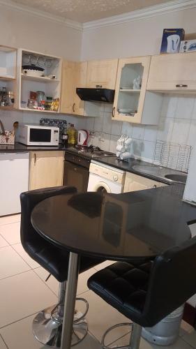 廚房, Carlcyn Homestay in 嘉博羅內