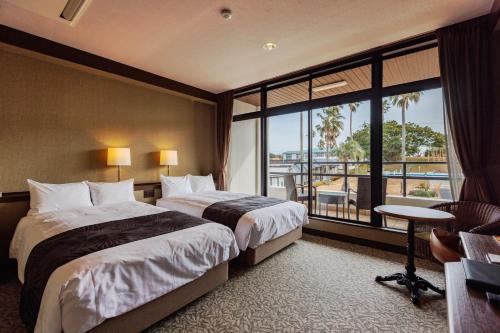 Standard Twin Room with Balcony and Garden View