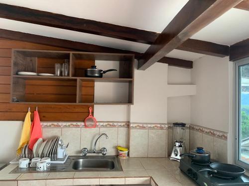 virtuve, MY HOUSE IN MACAS, SUITE AMOBLADA in Macas