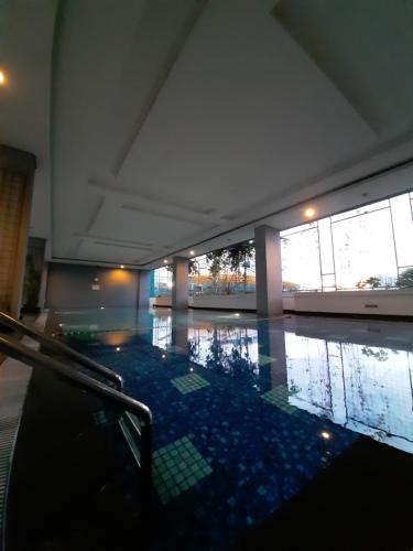 Swimming pool, Cozy The H Residence Cawang by Bonzela Property in Cawang