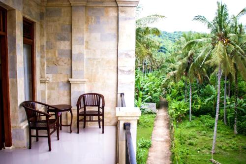 Balcony/terrace, Bali 85 Beach Inn in Padang Bai