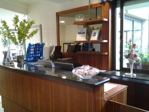 Фойє, Hotel Flora in Бібона