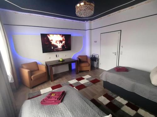 Best-Preis -Gold Suite- mit Netflix, Self-Check-In, eBike Ladestation, Fahrradraum, WLAN, Netflix und Massagesessel - direkt am Elberadweg im Herzen von Wittenberge in Wittenberge, Deutschland