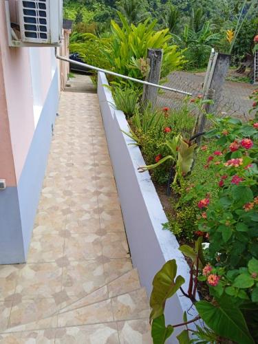 Градина, Maison de charme à Petit Bourg avec piscine partagée (Maison de charme a Petit Bourg avec piscine partagee) in Petit-Bourg