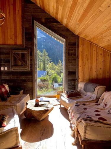 Mon Roc - Maison de montagne atypique avec vue gîte à louer Le Chazelet