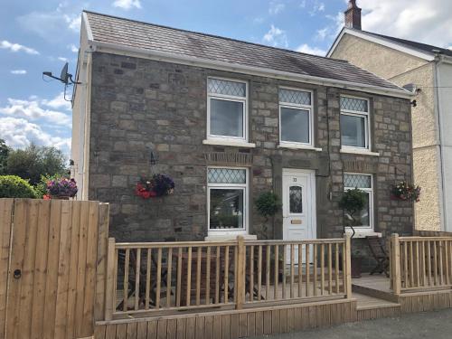 Woodland Cottage gîte à louer Cae Dommen