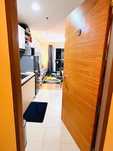 New Cozy 2 bedroom unit condotel for staycation with living room and kitchen set with pool