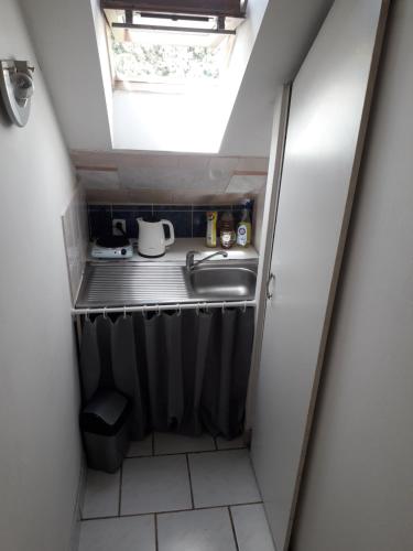 Podkrovní apartmán (Podkrovni apartman) in สลาโวนิน