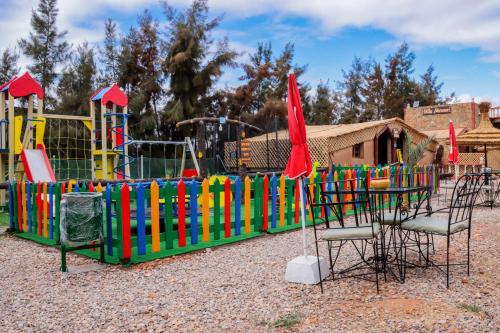 Parque infantil, Salma Palms Hôtel (Salma Palms Hotel) in Errachidia