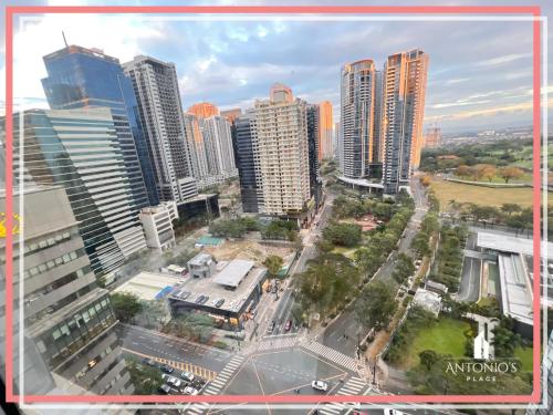 Panoramic View of City 1BR Loft Unit FREE WIFI & NETFLIX at Fort Victoria BGC, Manila (photo 7)