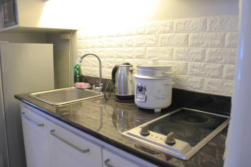 A2J BGC Luxury 1BR Suite Near Burgos Circle & Mall, Manila (fotografie 9)