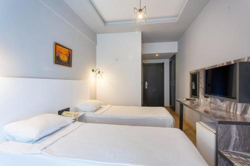 Habitación 2 camas, balcón