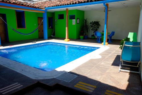 Swimming pool, Hostal Casa Verde in Santa Ana