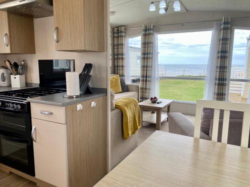 New Sea View Platinum Caravan with Huge Decking