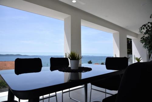 Deluxe Two-Bedroom Apartment with Terrace and Sea View