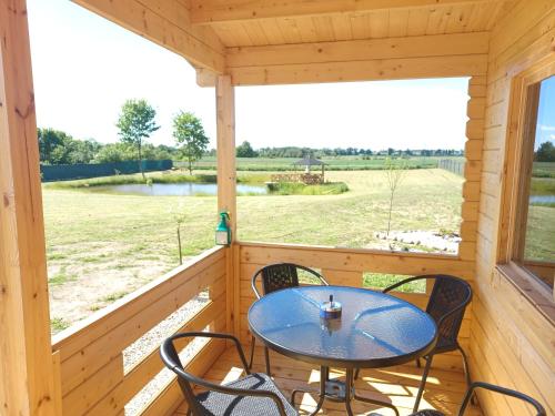 Balkons/terase, Domki nad stawem in Paslek