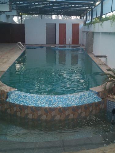 Swimming pool, Hotel Palmyra Grand Suite in Tirunelveli