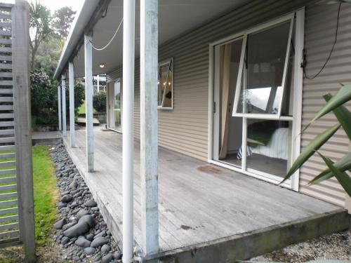 Exterior view, Ocean Beach Honey - Tairua Holiday Home in Tairua