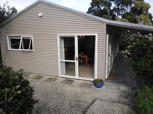 Exterior view, Ocean Beach Honey - Tairua Holiday Home in Tairua