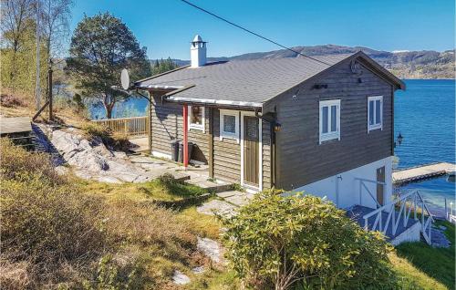 Amazing Home In Eikelandsosen With Sauna