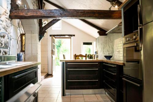 Maison de charme à proximité de Pau - 3 chambres - 6 p - Jardin (Maison de charme a proximite de Pau - 3 chambres - 6 p - Jardin) in Ousse