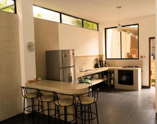 Cucina, RinaKawsay - ViveViajando Apartamento amoblado en Tena in Tena