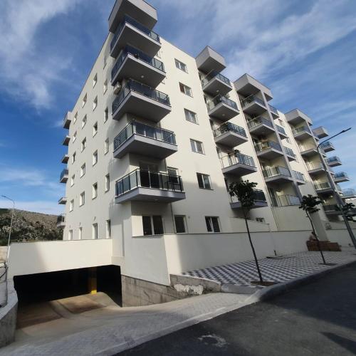 . Gimi Apartments Shengjin