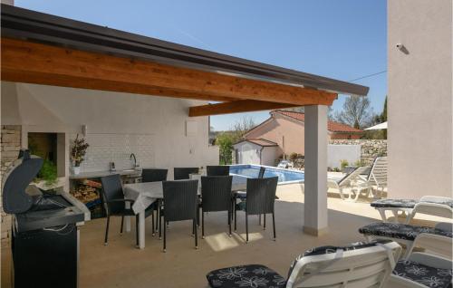 Pet Friendly Home In Fradelani With Outdoor Swimming Pool